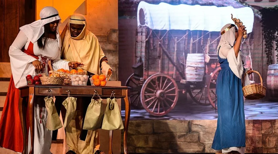 Costumed performers bringing a biblical marketplace to life